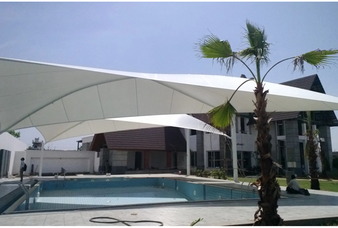 Retractable tensile structure roof